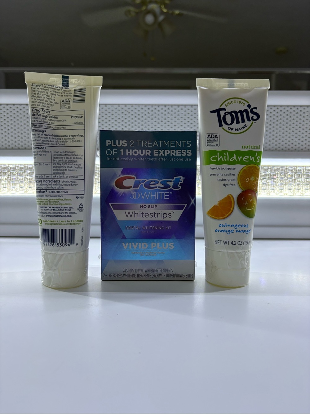 Crest 3D White Vivid Plus Teeth Whitening Strips and 2 Tom’s kids tooth paste